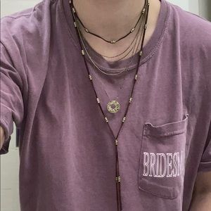 Free people layered necklace. Gold and Garnett